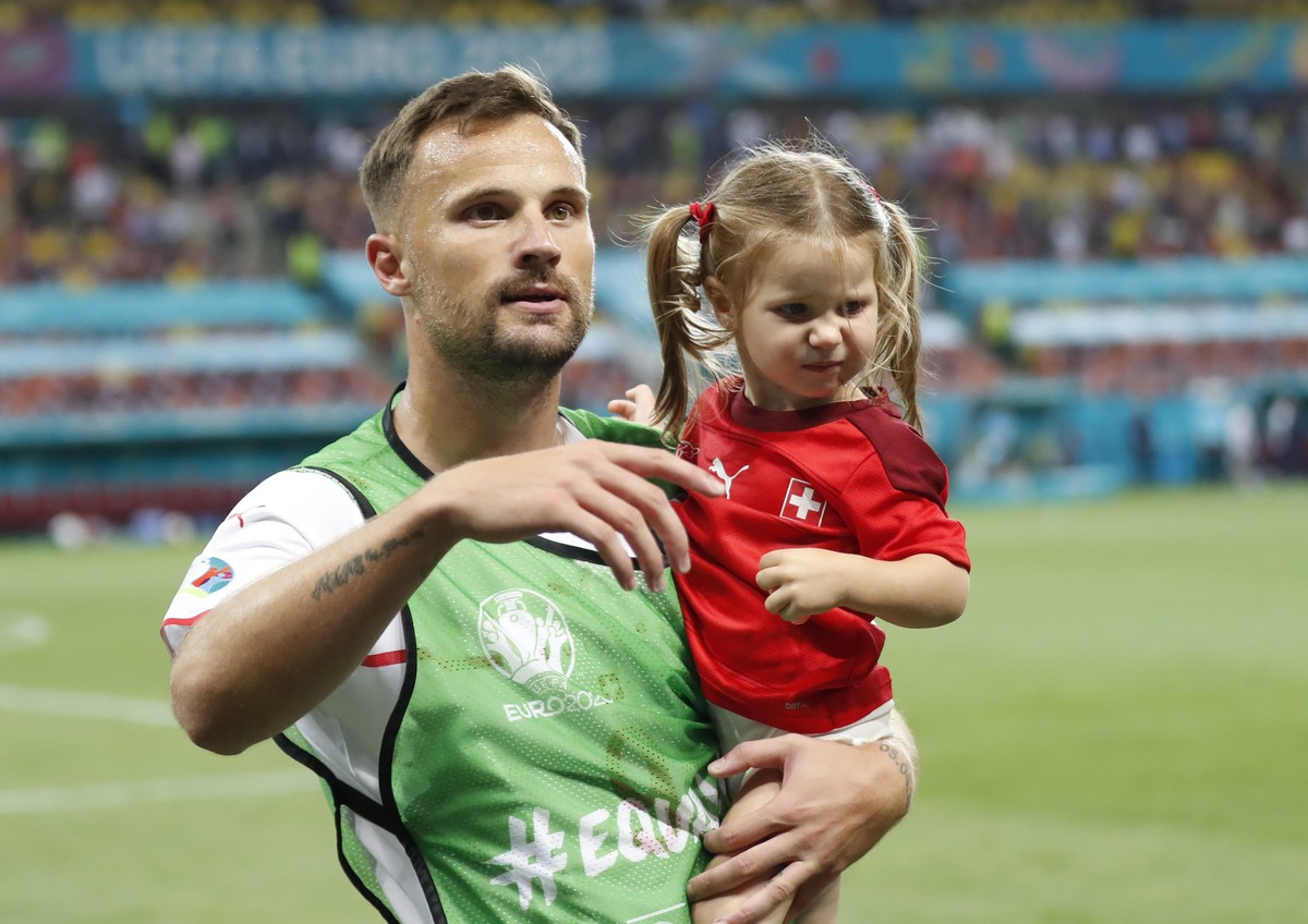 Switzerland's Haris Seferovic celebrates winning the Euro 2020 soccer championship round of 16 match between France and Switzerland at the National Arena stadium in Bucharest, Romania, Tuesday, J ...