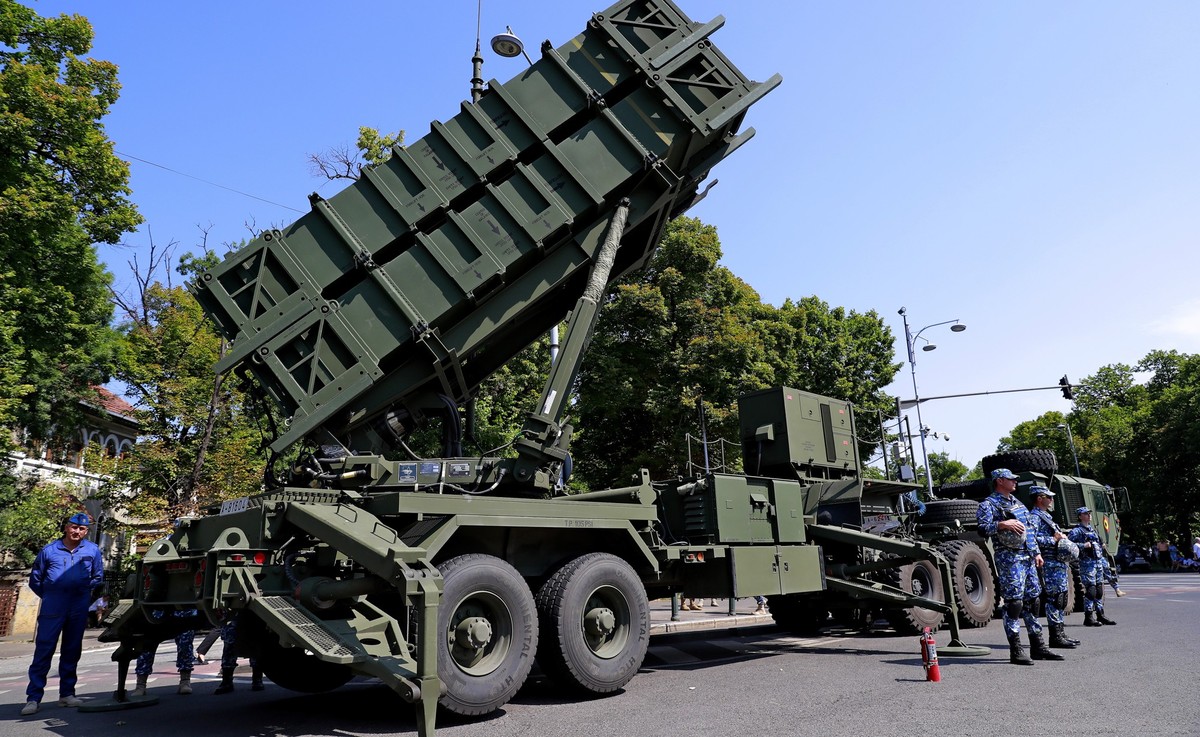 epa10757579 A surface-to-air missile (SAM) system MIM-104 Patriot is guarded by Romanian military during a ceremony marking the Aviation Day and Air Force Day, in Bucharest, Romania, 20 July 2023. The ...