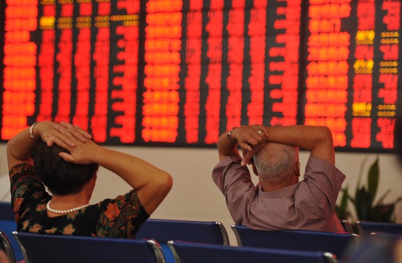 Ein gewohntes Bild: Chinesische Investoren starren auf Börsenkurse.