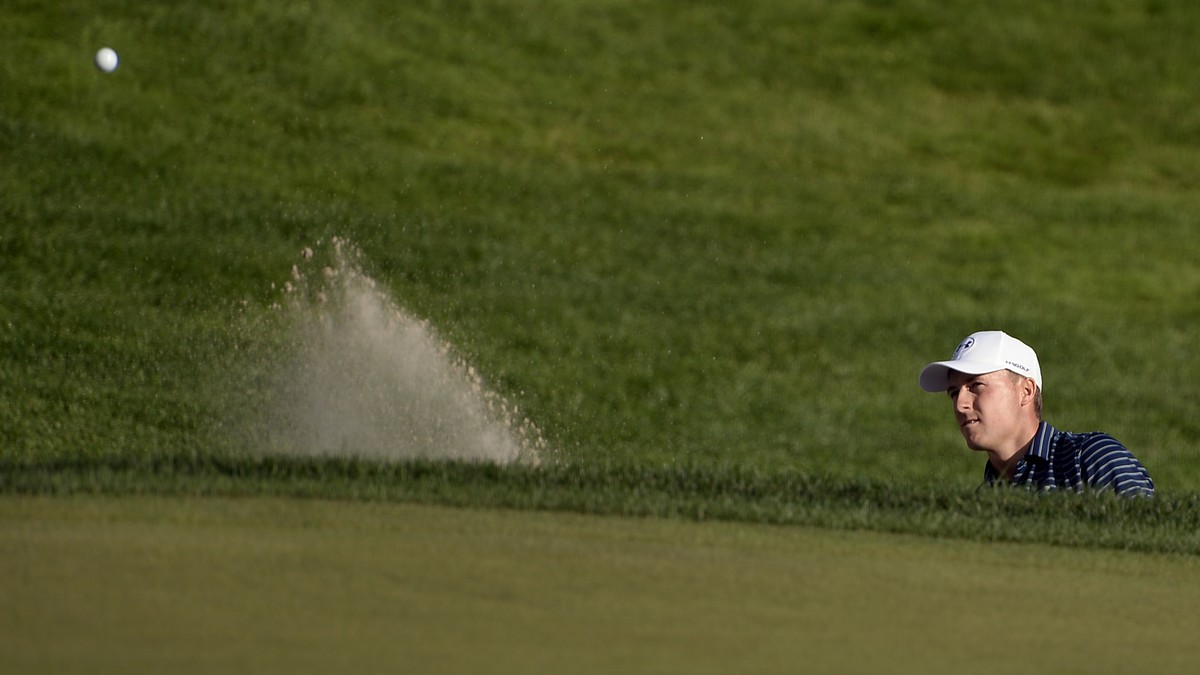 Jordan Spieth birdies from a bunker on the 18th during a playoff in the final round of the Travelers Championship golf tournament against Daniel Berger, Sunday, June 25, 2017, in Cromwell, Conn. (AP P ...