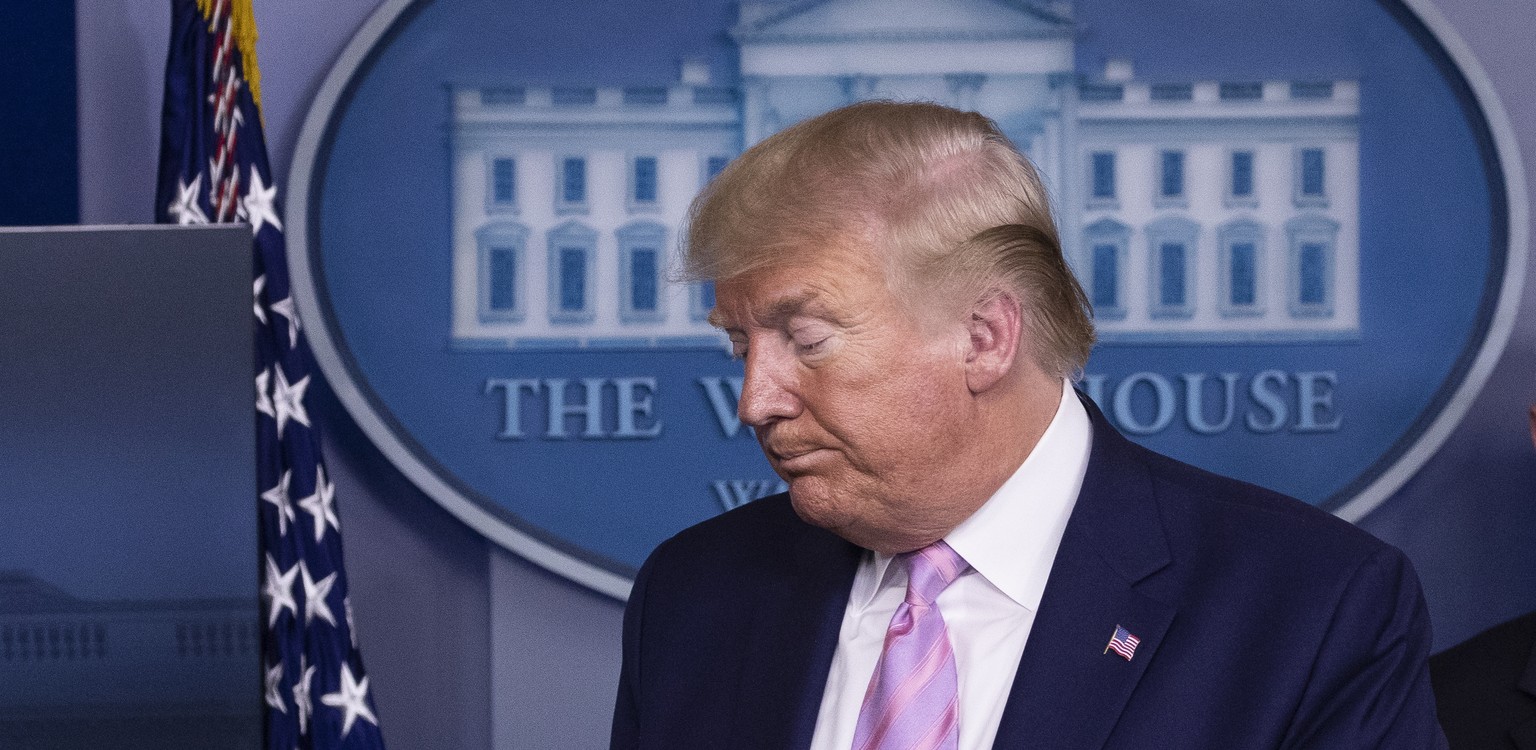 President Donald Trump departs after speaking about the coronavirus in the James Brady Press Briefing Room of the White House, Wednesday, April 1, 2020, in Washington. (AP Photo/Alex Brandon)
Donald T ...