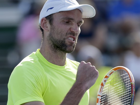 Ivo Karlovic, of Croatia, celebrates after winning a set against Donald Young during the final tennis match at the Delray Beach Open, in Delray Beach, Fla., Sunday, Feb. 22, 2015. Karlovic won 6-3, 6- ...