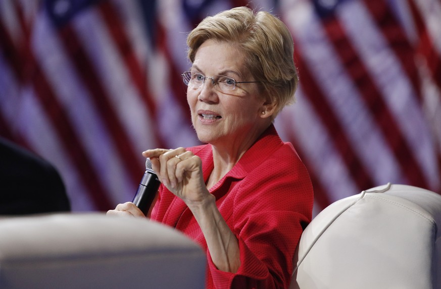 FILE - In this Oct. 2, 2019 file photo, Democratic presidential candidate Sen. Elizabeth Warren, D-Mass., speaks during a gun safety forum in Las Vegas. Bernie Sanders and Elizabeth Warren raked in mo ...