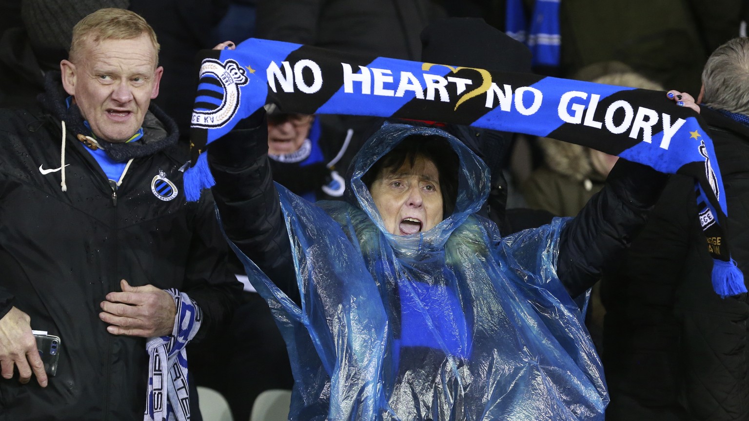 epa08231997 Supporters of Brugge cheer during the UEFA Europa League Round of 32, 1st leg match between Club Brugge and Manchester United in Bruges, Belgium, 20 February 2020. EPA/STEPHANIE LECOCQ