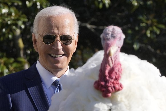 President Joe Biden speaks after pardoning the national Thanksgiving turkey, Peach, during a ceremony on the South Lawn of the White House in Washington, Monday, Nov. 25, 2024. (AP Photo/Mark Schiefel ...