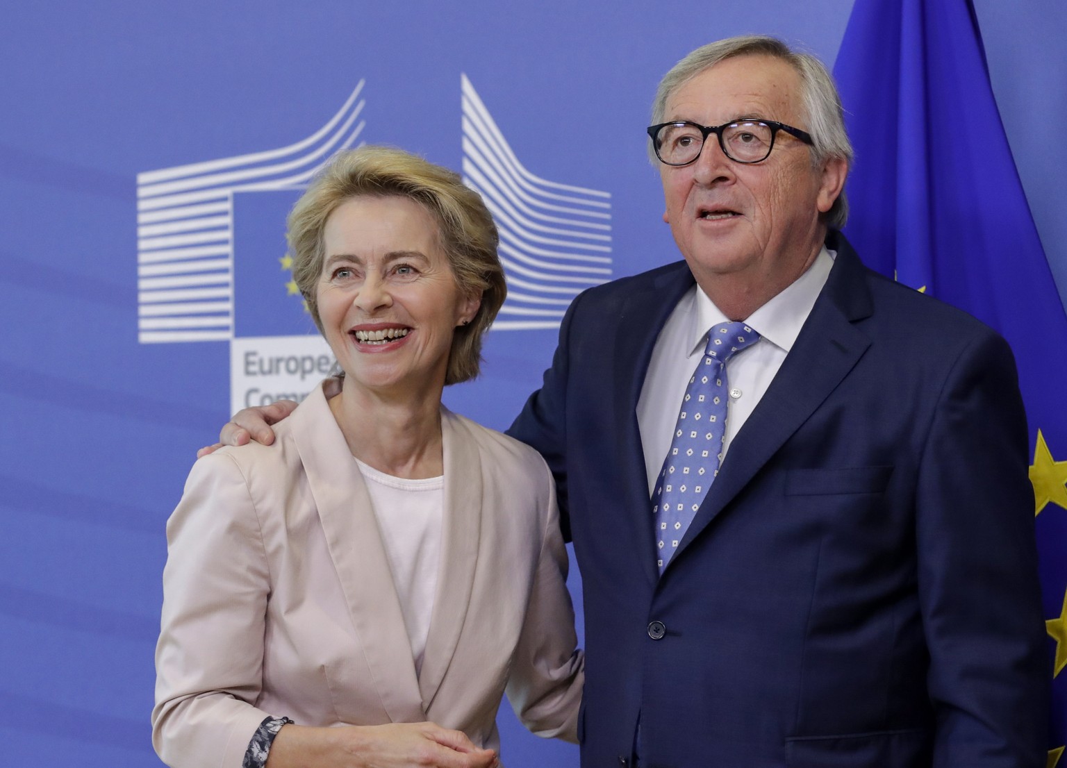 epa07693866 Ursula von der Leyen (L), the nominated President of the European Commission is welcomed by European Commission President Jean-Claude Juncker during a visit at the European Commission in B ...