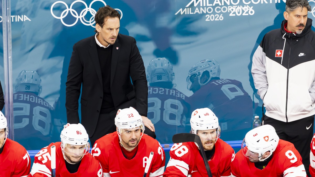 Patrick Fischer, head coach of Switzerland national ice hockey team, observes the game, during the men's group A preliminary round game between Switzerland and France at the 2026 Olympic Winter G ...