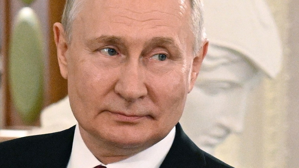 epa10697092 A handout photo made available by Photo host Agency RIA Novosti shows Russian President Vladimir Putin attending a meeting with a delegation of African leaders and senior officials on the  ...