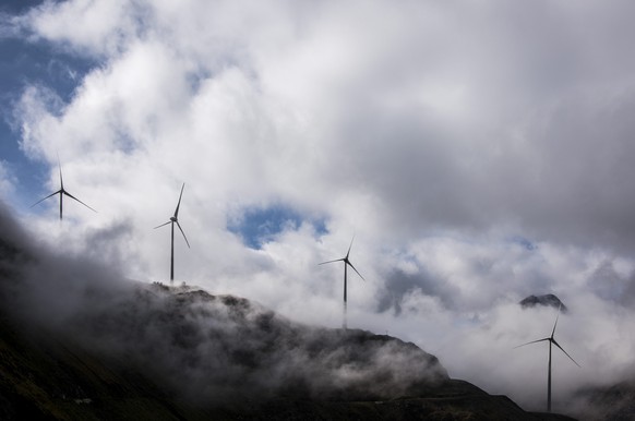 epa05563589 Wind turbines at the site of the highest wind park in Europe are pictured at the Griessee, near the Nufenenpass in the Swiss south Alpes, Valais, Switzerland, in an image dated 23 Septembe ...