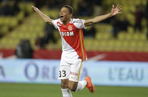 FILE - In this Saturday, Feb. 20, 2016 file photo, Monaco&#039;s Kylian Mbappe Lottin celebrates scoring the third goal against Troyes during their French League One soccer match, in Monaco. Les Moneg ...