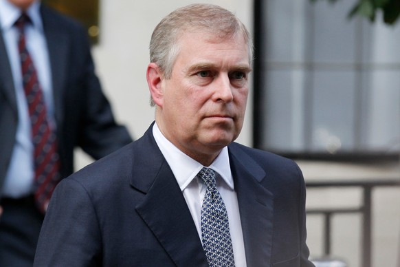 FILE- Britain's Prince Andrew leaves King Edward VII hospital in London after visiting his father Prince Philip, June 6, 2012. (AP Photo/Sang Tan, File)
Prince Andrew