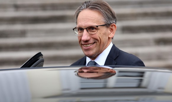 epa11707503 Germany&#039;s newly appointed Finance Minister Joerg Kukies leaves after he received the certificate of appointment from German President Steinmeier at Bellevue Palace in Berlin, Germany, ...