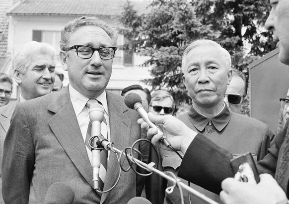 FILE - US President Nixon&#039;s National Security Adviser Henry A. Kissinger, left, and Le Duc Tho, member of Hanoi&#039;s Politburo, are photographed outside a suburban house at Gif Sur Yvette in Pa ...