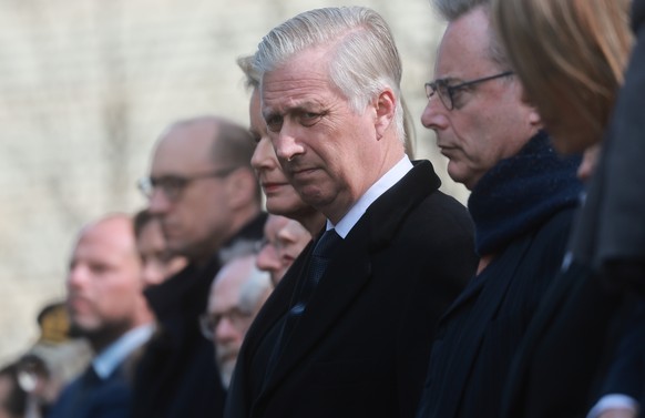 epa12841095 King Philippe of Belgium (L) with Prime Minister Bart de Wever attending a memorial ceremony on the 10th anniversary of the Brussels attacks in Brussels, Belgium, 22 March 2026. Brussels w ...