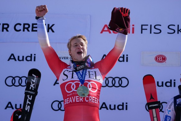 First place finisher Switzerland's Marco Odermatt celebrates after a World Cup men's downhill skiing race, Thursday, Dec. 4, 2025, in Beaver Creek, Colo. (AP Photo/John Locher)
US World Cup  ...