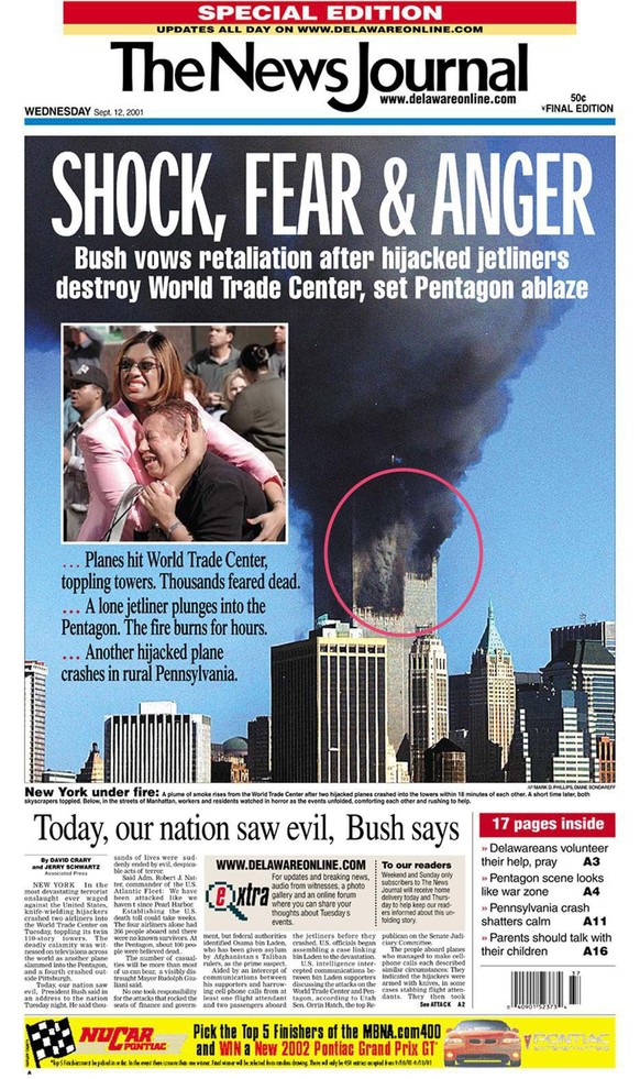Attentat auf das World Trade Center in Manhattan am 11. September 2001: Angebliche Teufelsfratze im aufsteigenden Rauch (roter Kreis). Das Bild stammt vom Photojournalisten Mark D. Phillips, seine Ech ...