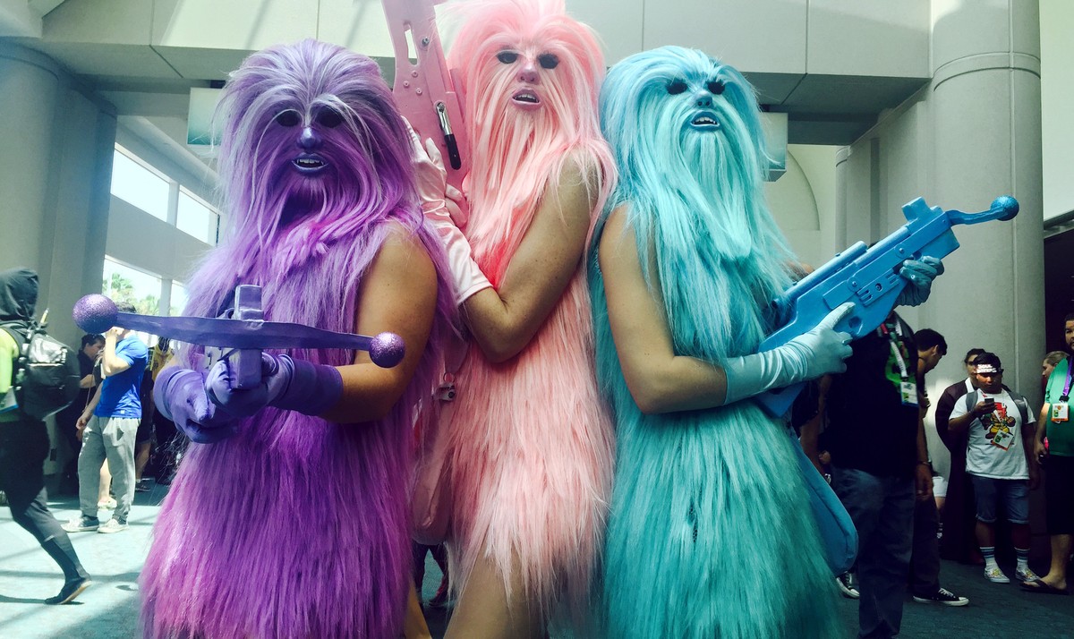 FILE - In this July 10, 2015 file photo, fans dressed as "Chewie's Angels" attend day 2 of Comic-Con International, in San Diego, Calif. Star Wars inspires curiously personal reactions ...