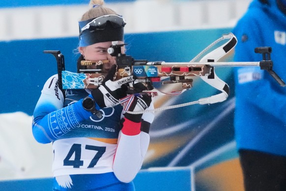 Ukaleq Astri Slettemark of Denmark competes during the biathlon women's 7.5 km sprint at the 2026 Winter Olympics, in Anterselva, Italy, Saturday, Feb. 14, 2026. (AP Photo/Christophe Ena)
Milan C ...
