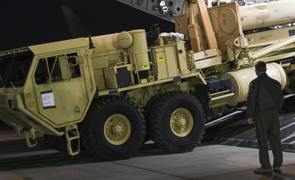 epa05833750 A handout photo made available by the United States Forces Korea shows parts of an advanced US missile defense system being unloaded from a cargo plane at the Osan Air Base in Seoul, South ...