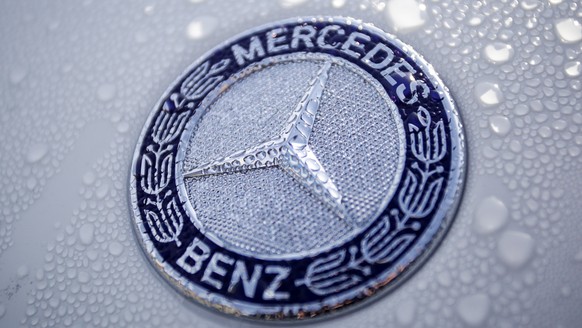 epa07486360 (FILE) - A logo of car maker Mercedes Benz is pictured on a new car at the port of Bremerhaven, northern Germany, 03 March 2017 (reissued 05 April 2019). Media reports on 05 April 2019 sta ...