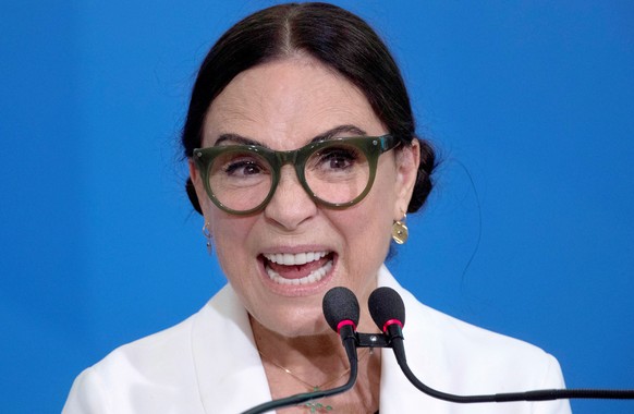 epa08269543 Actress Regina Duarte, known for her roles in famous soap operas, reacts during the ceremony to assume the Ministry of Culture, in Brasilia, Brazil, 04 march 2020. Duarte assumed Wednesday ...