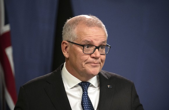 Former Australian Prime Minister Scott Morrison speaks during a news conference in Sydney, Wednesday, Aug. 17, 2022. Morrison defends his decision to secretly appoint himself to five ministerial roles ...