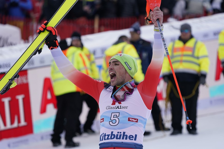 Switzerland's Daniel Yule celebrates after winning an alpine ski, men's World Cup slalom race in Kitzbuehel, Austria, Sunday, Jan. 22, 2023. (AP Photo/Giovanni Auletta)