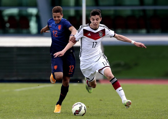 VILA REAL DE SANTO ANTONIO, PORTUGAL - FEBRUARY 16: Kai Havertz of Germany challenges Justin Lonwijk of Netherlands during the U16 UEFA development tournament between Germany and Netherlands on Februa ...