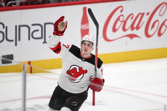 New Jersey Devils defenseman Simon Nemec (17) celebrates after his winning goal during a shootout of an NHL hockey game against the Washington Capitals, Saturday, Nov. 15, 2025, in Washington. (AP Pho ...