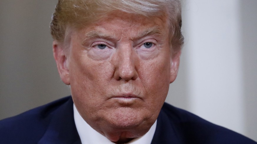 U.S. President Donald Trump looks on at the beginning of a meeting with Russian President Vladimir Putin at the Presidential Palace in Helsinki, Finland, Monday, July 16, 2018. (AP Photo/Pablo Martine ...