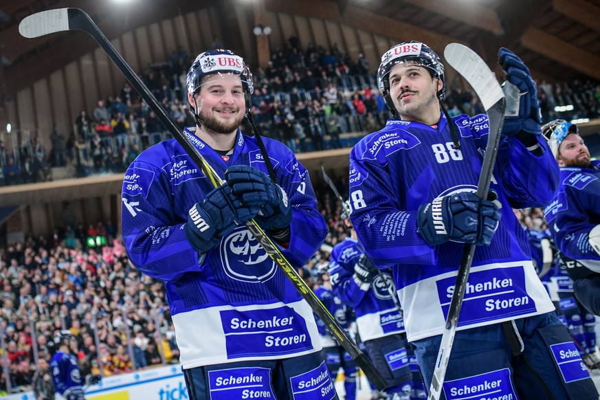 Ambri&#039;s Dominic Zwerger, left, and Inti Pestoni after the game between Switzerland&#039;s HC Ambri-Piotta and Finland&#039;s IFK Helsinki, at the 94th Spengler Cup ice hockey tournament in Davos, ...