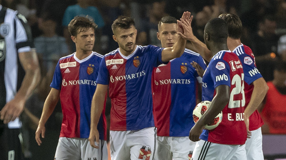 FC Basel's players cheer after scoring during the UEFA Champions League second qualifying round first leg match between Greece's PAOK FC and Switzerland's FC Basel 1893 in the Toumba st ...