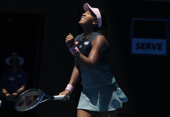 Japan&#039;s Naomi Osaka celebrates after defeating Latvia&#039;s Anastasija Sevastova during their fourth round match at the Australian Open tennis championships in Melbourne, Australia, Monday, Jan. ...