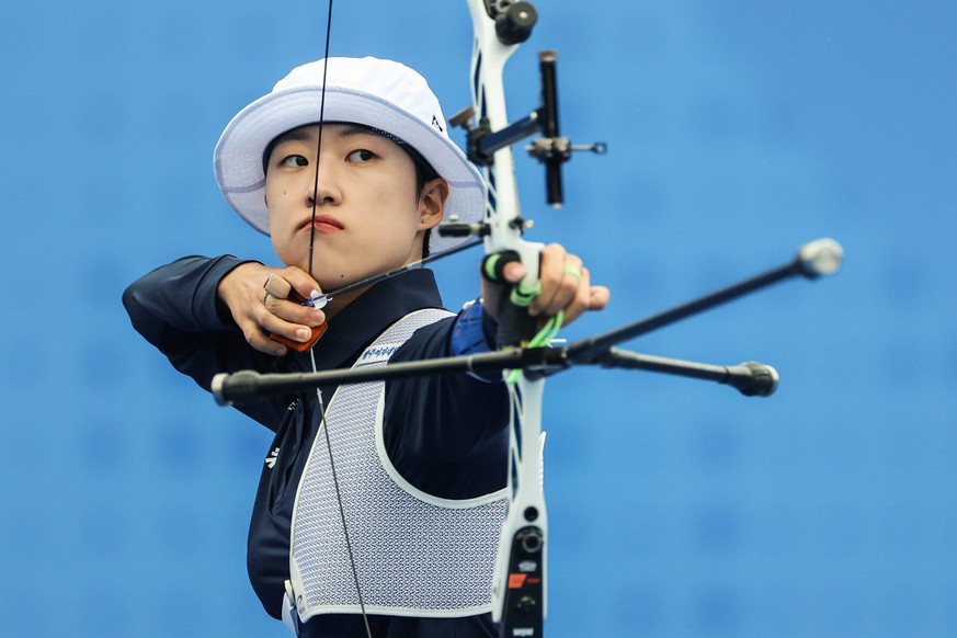231007 -- HANGZHOU, Oct. 7, 2023 -- An San of South Korea competes during the Recurve Women s Individual Gold Medal Match of Archery at the 19th Asian Games in Hangzhou, east China s Zhejiang Province ...