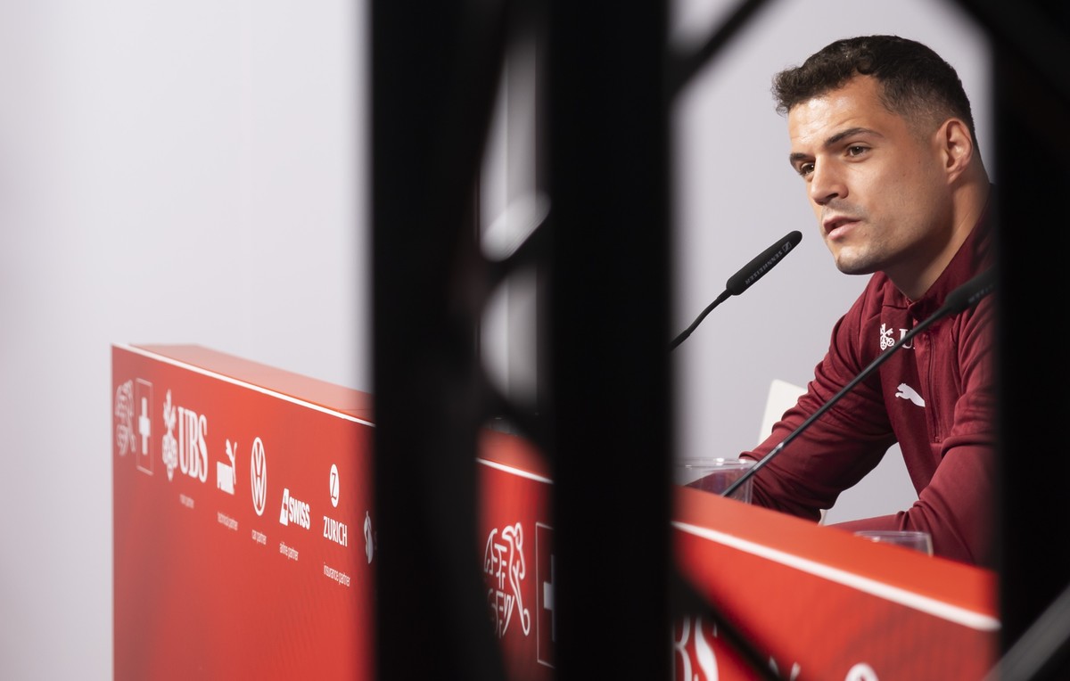 Switzerland's captain Granit Xhaka answers questions during a press conference at the "Stadion auf der Waldau" in Stuttgart, Germany, Sunday, June 30, 2024.(KEYSTONE/Peter Klaunzer)