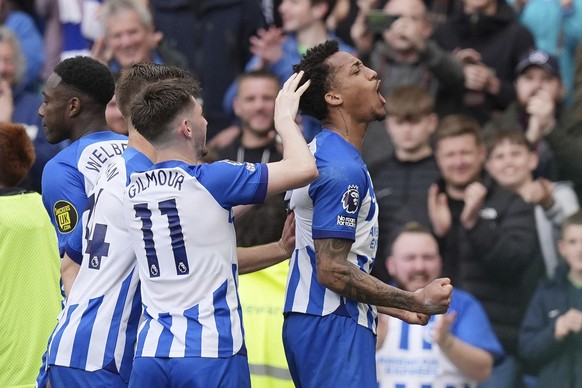 Brighton and Hove Albion&#039;s Joao Pedro, right, celebrates after scoring the opening goal of the game during the Premier League match between Brighton &amp; Hove Albion and Aston Villa, at the Amer ...