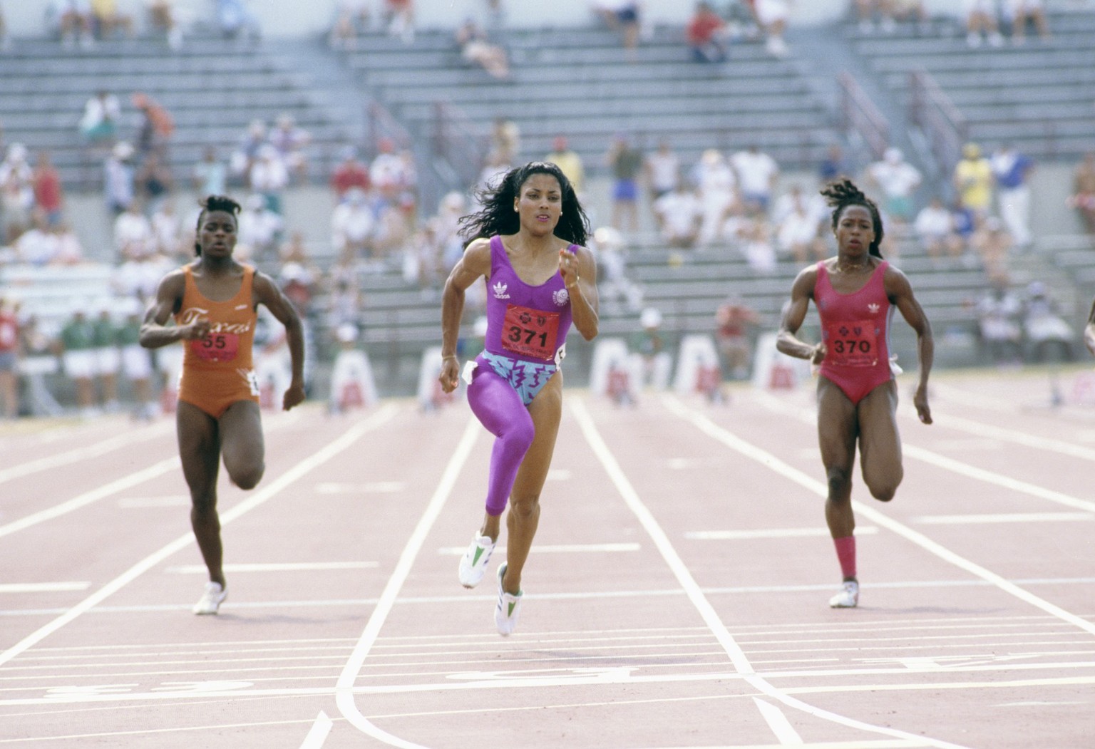 Track &amp; Field: US Olympic Trials: Florence Griffith-Joyner (371) in action, leading a winning 100M race during Women&#039;s Quarterfinals at IU Michael A. Carroll Track &amp; Soccer Stadium. India ...