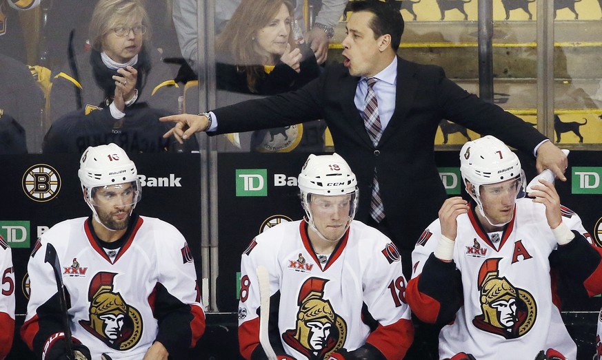 Ottawa Senators head coach Guy Boucher gives instructions during the third period in game six of a first-round NHL hockey Stanley Cup playoff series against the Boston Bruins, Sunday, April 23, 2017,  ...
