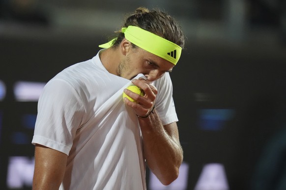 Germany&#039;s Alexander Zverev reacts during a quarter-final tennis match against Italy&#039;s Lorenzo Musetti at the Italian Open in Rome, Italy, Wednesday, May 14, 2025. (AP Photo/Alessandra Tarant ...