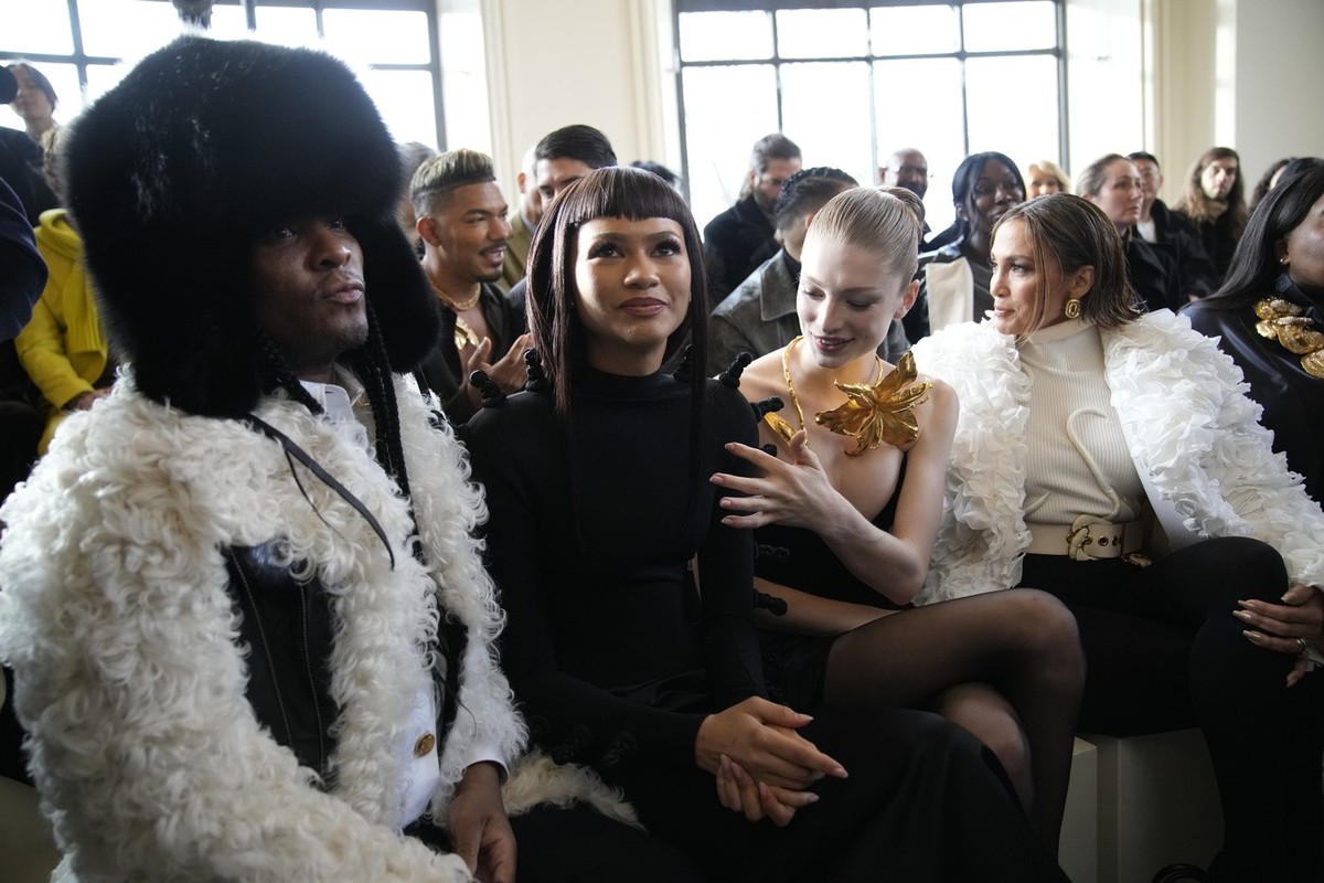 Jennifer Lopez, right, and Zendaya, second left, attend Schiaparelli's Haute Couture Spring-Summer 2024 collection presented in Paris, Monday, Jan. 22, 2024. (AP Photo/Christophe Ena)