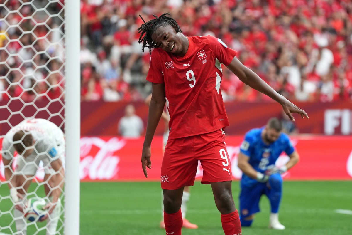 Switzerland's Johan Manzambi (9) celebrates after scoring during the World Cup Group B soccer match between Switzerland and Canada in Vancouver, British Columbia, Wednesday, June 24, 2026. (AP Ph ...