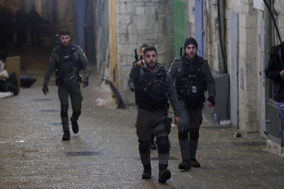epa10553074 Israeli police block the alley of the Chain Gate leading to the Al Aqsa Mosque complex in Jerusalem in early April 01, 2023.  Unit of Police Spokespersons (Jerusalem District) reported…