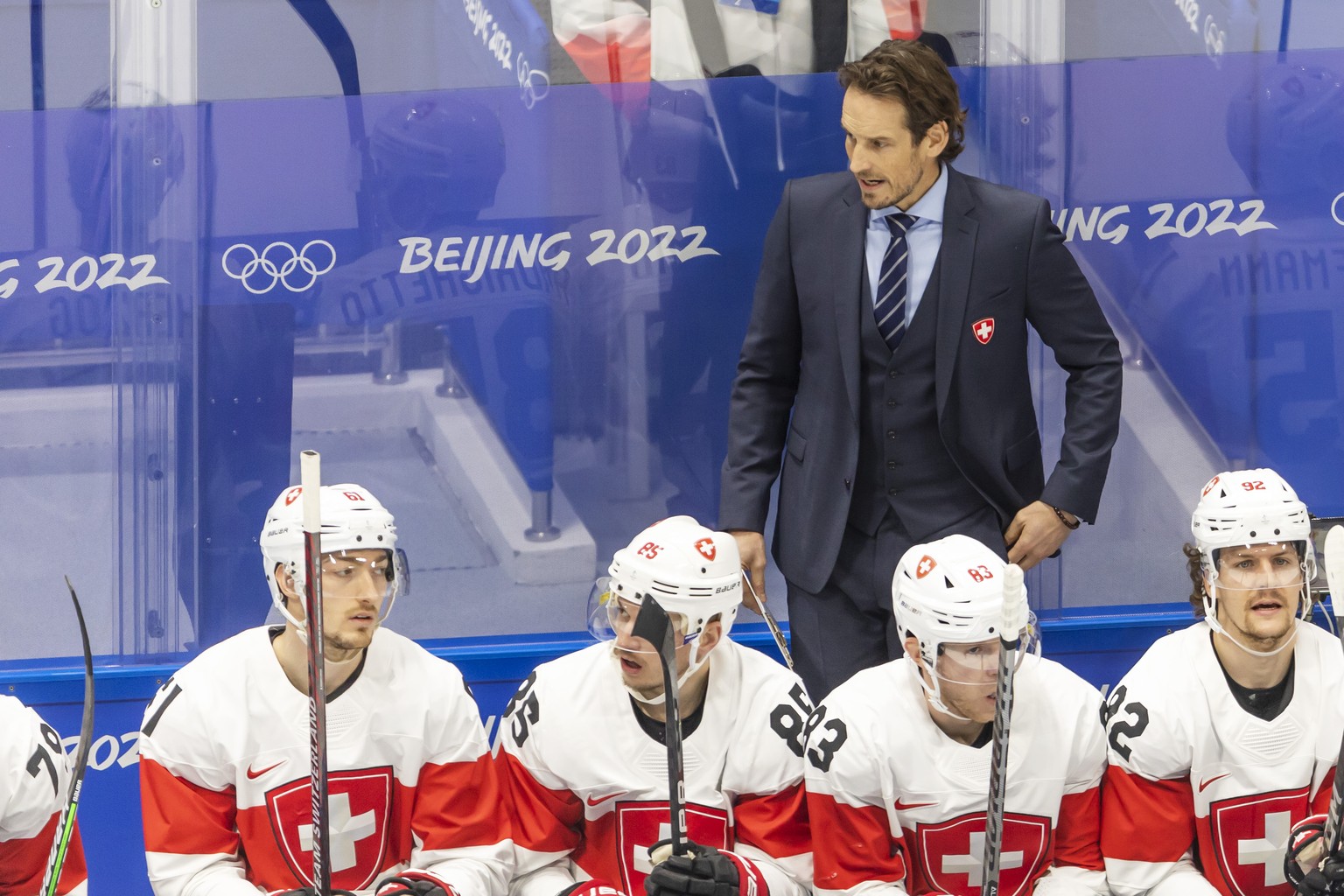Patrick Fischer, head coach of Switzerland national ice hockey team, talks to his players, during the men&#039;s ice hockey preliminary round game between Czech Republic and Switzerland at the Nationa ...
