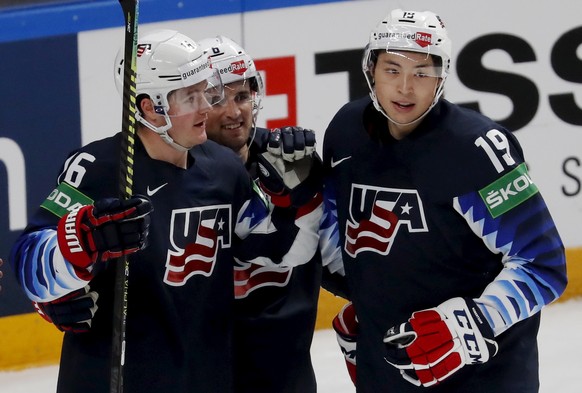 epa09239187 Jason Robertson (R) of USA celebrates with teammates after scoring the 1-0 goal during the IIHF 2021 World Ice Hockey Championships group B match between USA and Germany at the Arena Riga, ...
