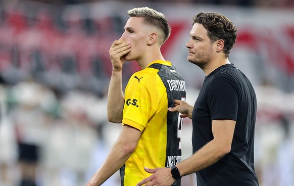 epa11263025 Dortmund&#039;s head coach Edin Terzic (R) and Dortmund&#039;s Nico Schlotterbeck react after losing the German Bundesliga soccer match between Borussia Dortmund and VfB Stuttgart in Dortm ...