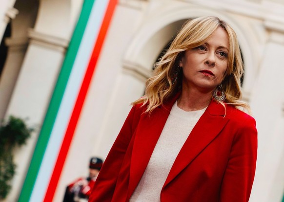 epa12585288 A handout photo made available by Chigi Palace press office shows Italian Prime Minister Giorgia Meloni during a welcoming ceremony for Mozambique's President Daniel Chapo (not pictur ...