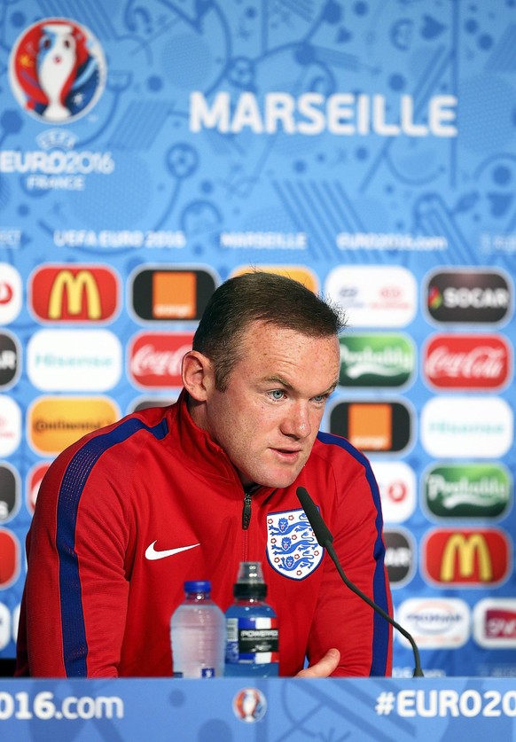 epa05356098 England captain Wayne Rooney speaks during a press conference at Stade Velodrome in Marseille, France, 10 June 2016. England will face Russia in the UEFA EURO 2016 group B preliminary roun ...