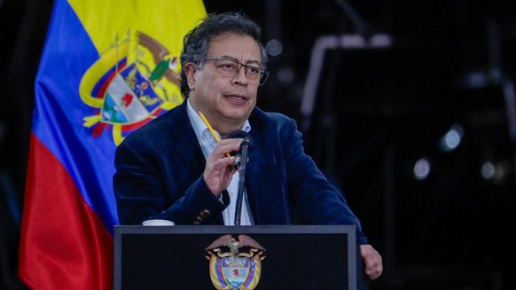 epa11733945 Colombian President Gustavo Petro speaks during the ceremony commemorating the eighth anniversary of the signing of the peace agreement, at the Plaza de Bolivar in Bogota, Colombia, 21 Nov ...