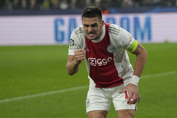 Ajax&#039;s Dusan Tadic celebrates after scoring his side&#039;s opening goal during the Champions League group C soccer match between Borussia Dortmund and Ajax Amsterdam in Dortmund, Germany, Wednes ...