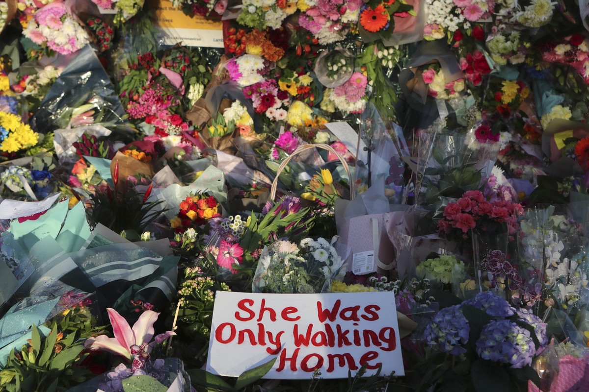 Floral tributes are placed at the bandstand in Clapham Common on Sunday, March 14, 2021, in memory of Sarah Everard who abducted and murdered after last being seen walking home from a friend's ap ...